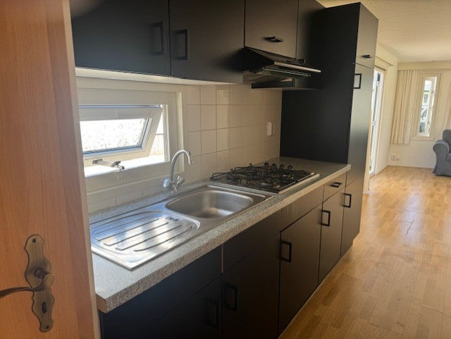Ruime kunststof woning met 3 slaapkamers,cv en dubbelglas Gereserveerd!