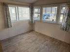 Kunststof woning met 2 slaapkamers en dubbelglas VERKOCHT!