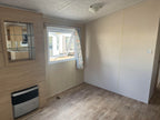 Kunststof woning met 2 slaapkamers en dubbelglas VERKOCHT!